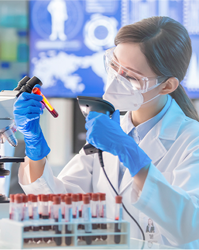 Scientist using lab equipment